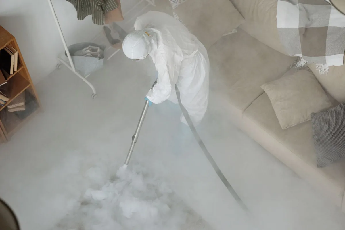 Biohazard cleanup technician in protective equipment, Marlborough Heights / Marlborough Pride, Kansas City, MO